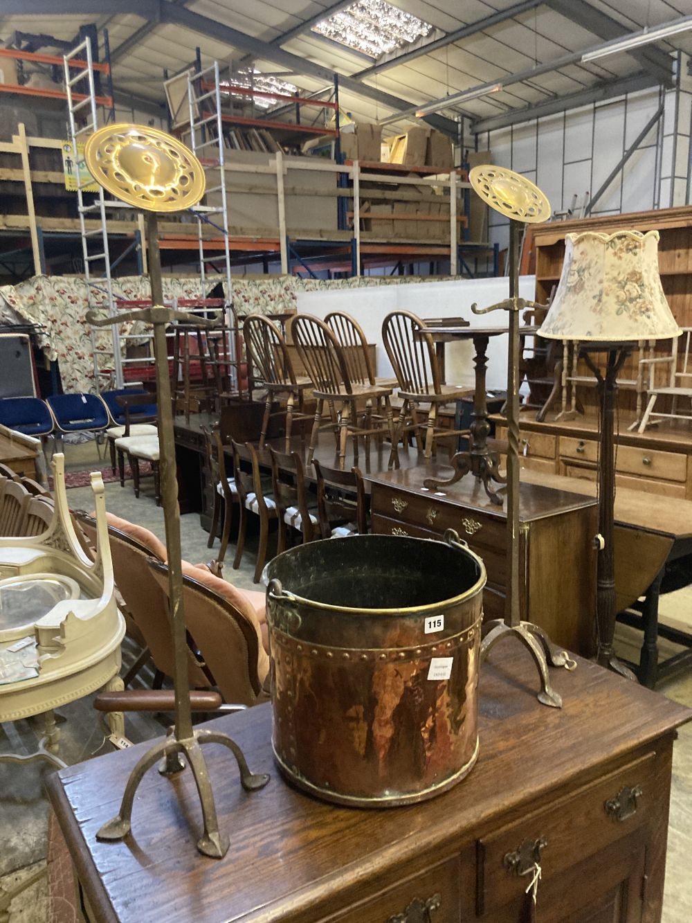 A Victorian copper and brass circular coal bucket, diameter 34cm, together with a pair of brass and wrought iron andirons